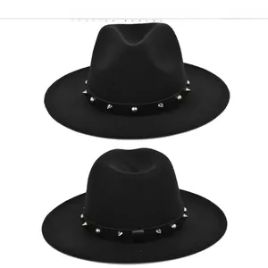 Detail of black wool fedora with leather band featuring silver spikes and metal rivets