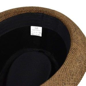 Close-up of brown paper straw fedora hat interior with sweatband and size 58 care label