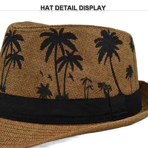 Brown straw fedora hat with black tropical palm tree print ribbon detail