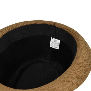 Detail view of the 100% paper straw hat interior with sweatband and size 58 label
