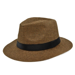 Detail of classic brown straw fedora hat featuring a fine weave and black ribbon band