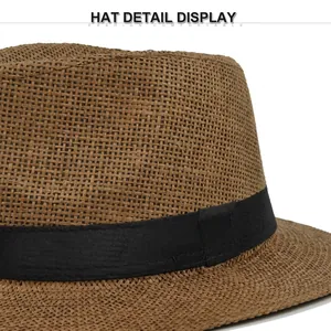 Classic brown straw panama hat with black grosgrain ribbon for sun protection
