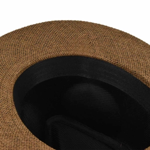 Detail view of woven straw sun hat interior showing precision weave and black sweatband