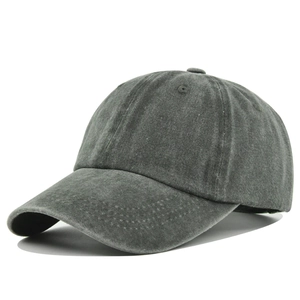 Detail view of washed cotton vintage baseball cap with rustic texture and curved brim