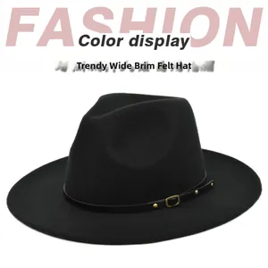 Close-up of black wool felt fedora featuring three golden rivets and thin leather band