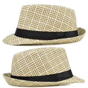 Detail view of woven straw fedora hat featuring classic black ribbon and plaid texture