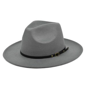 Detail of grey wool fedora hat featuring a black leather band and gold buckle accent