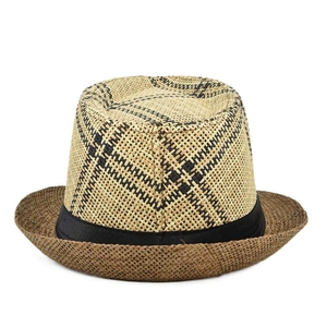 Detail of checkered woven straw fedora featuring a black satin ribbon and brown brim edge