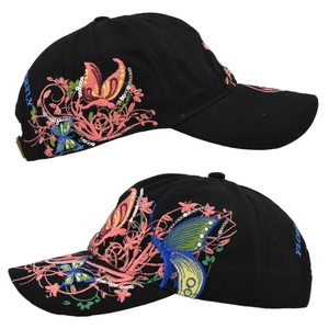 Detailed close-up of colorful 3D butterfly embroidery and sequins on black baseball cap