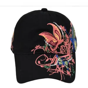 Detailed embroidery of colorful flowers and butterflies with silver sequins on black canvas cap
