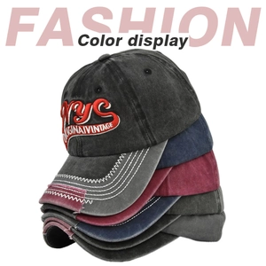 Detail view of multi-color vintage washed cotton baseball caps with NYC 3D embroidery