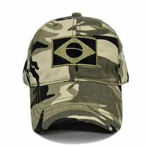 Detailed macro view of the camouflage pattern fabric and tactical embroidery on the hat
