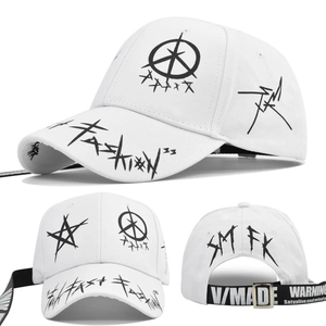 Close-up of graffiti patterns and long black straps on a white cotton baseball cap