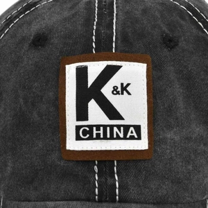 Vintage washed dark grey cotton baseball cap with KK patch and contrast white stitching