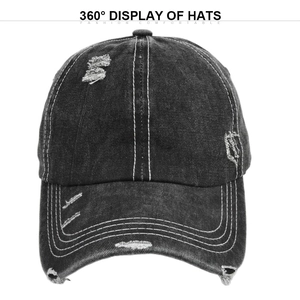 Close-up detail of vintage distressed denim baseball cap with frayed holes and white stitching