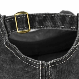 Macro shot of the vintage distressed baseball cap adjustable metal buckle and stitching