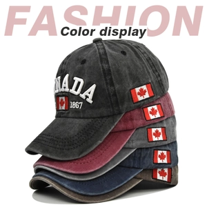 Detailed close-up showing embroidered Canada flag patch on multiple washed baseball caps