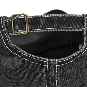 Rear view of vintage grey denim baseball cap with adjustable metal buckle and contrast stitching