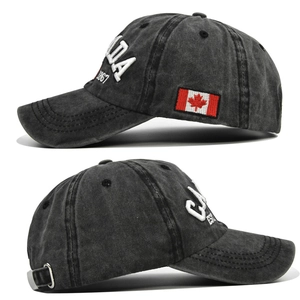 Macro detail of Canada embroidery and vintage washed texture on baseball cap
