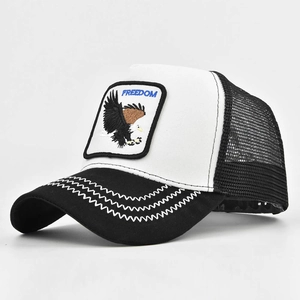 Detail of the Freedom bald eagle embroidery patch on a mesh trucker hat with wavy stitching