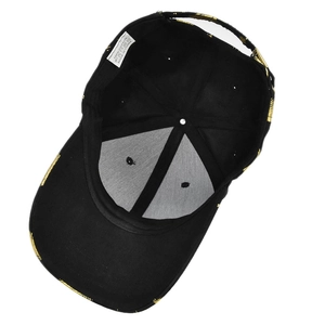 Detail view of the black cotton baseball cap interior with gold leaf foil print and sweatband