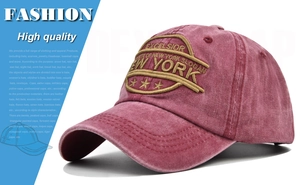 Detailed close-up of vintage burgundy baseball cap with 3D New York embroidery and stitching