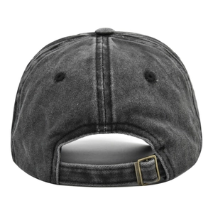 Detail view of the vintage charcoal baseball cap showing adjustable metal bronze buckle strap