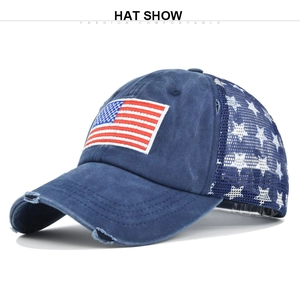Detail of vintage washed baseball cap with American flag patch and star mesh back