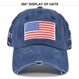 Detail of vintage washed navy cotton baseball cap with American flag embroidery and mesh