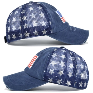 Detail of navy trucker hat featuring distressed brim, American flag embroidery and mesh