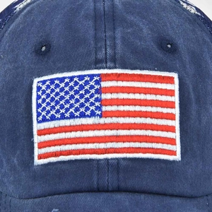 Navy blue washed baseball cap with embroidered American flag patch on the front panel