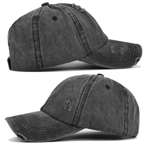 Detailed view of charcoal gray distressed baseball cap with vintage frayed ripped effects