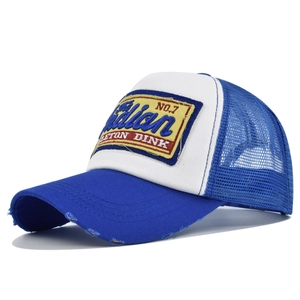Close-up of vintage blue and white trucker hat with Indian No.7 embroidery and worn brim