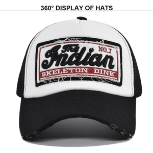 Close-up of vintage trucker hat with 3D letter embroidery and distressed mesh details
