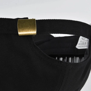Black cotton baseball cap featuring five-point star embroidery and adjustable metal buckle
