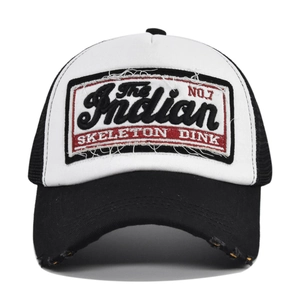 Distressed black and white mesh trucker hat with Indian embroidery patch on white background