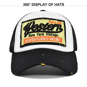 Nahaufnahme der Vintage Western Stickerei und des Distressed Patches auf der Netz-Trucker-Kappe