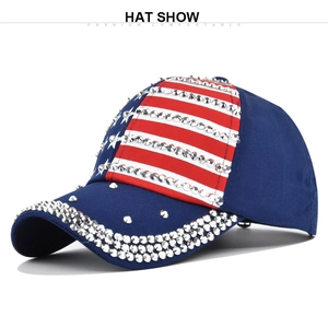 Close-up of American flag baseball cap with shiny silver rhinestones on the brim