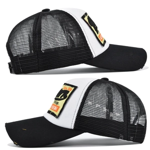 Detailansicht der Vintage-Baseballkappe mit gelber 3D-Stickerei und atmungsaktivem Mesh-Netz