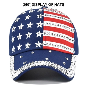 Detail of American flag baseball cap with silver studs and rhinestones on the brim