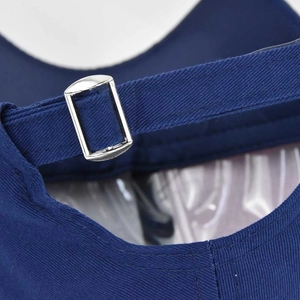 Macro detail of navy blue cotton baseball cap with adjustable silver metal back buckle