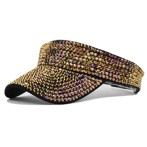 Detail of black sun visor hat with multi-colored rhinestones and shimmering crystals