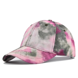 Detailed view of pink and grey tie-dye cotton canvas baseball cap with curved brim