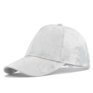 Detail view of tie-dye baseball cap with blue marble pattern and adjustable strap