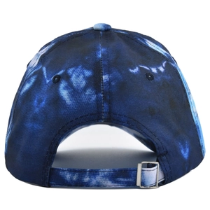 Detailed back view of a blue tie-dye baseball cap with adjustable metal buckle strap