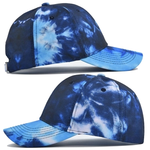 Detailed view of the tie-dye pattern on the six-panel baseball cap with adjustable metal buckle