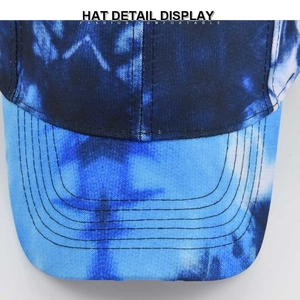 Blue tie-dye baseball cap with reinforced six-row stitching and cotton canvas texture