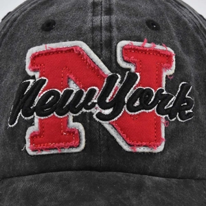 Vintage washed dark grey cotton baseball cap with embroidered New York NY patch detail