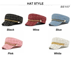 Collage of tweed newsboy caps in five colors with gold chain and button details