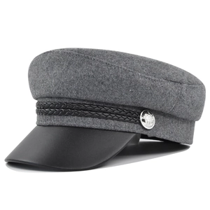 Retro grey wool newsboy cap with black leather visor and silver metal button detail